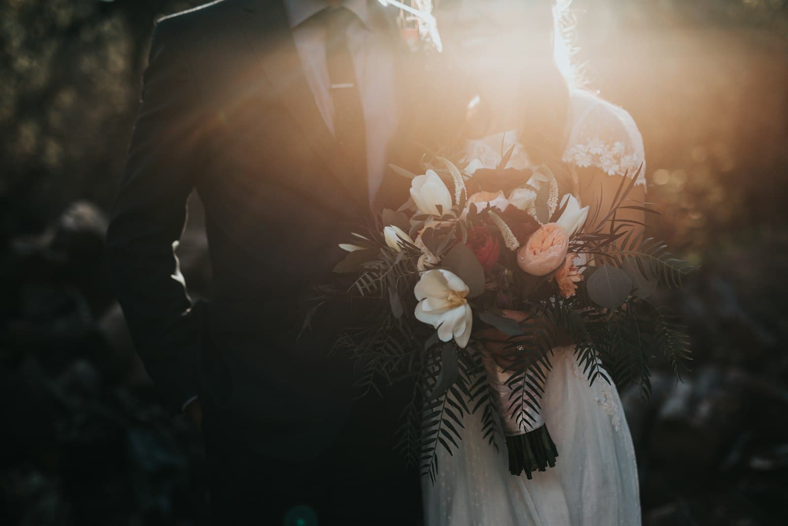 A couple walking hand in hand after the ceremony